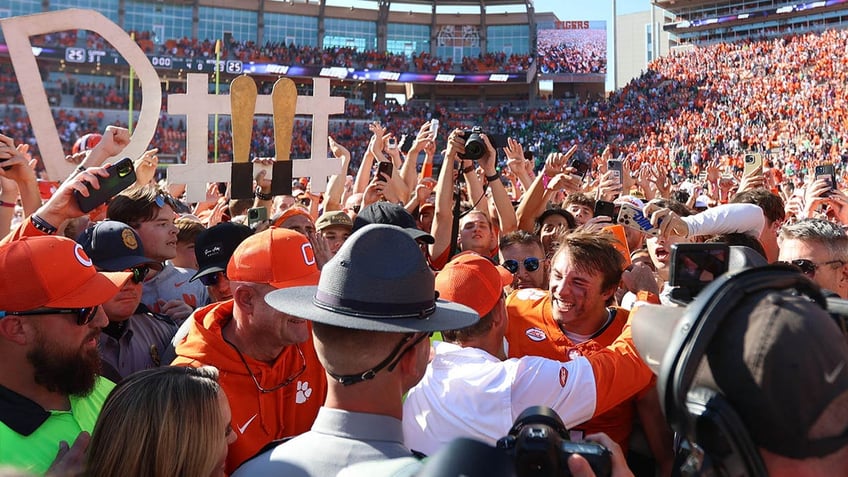 Clemson Tigers players celebrate after a win