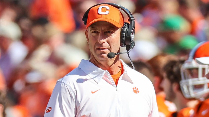 clemsons dabo swinney implores fans to buy stock in them after upset win over notre dame