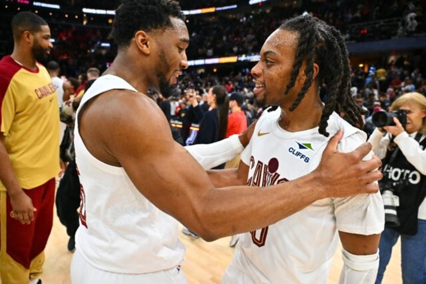 Cleveland team-mates and fellow All-Stars Donovan Mitchell (left) and Darius Garland (righ