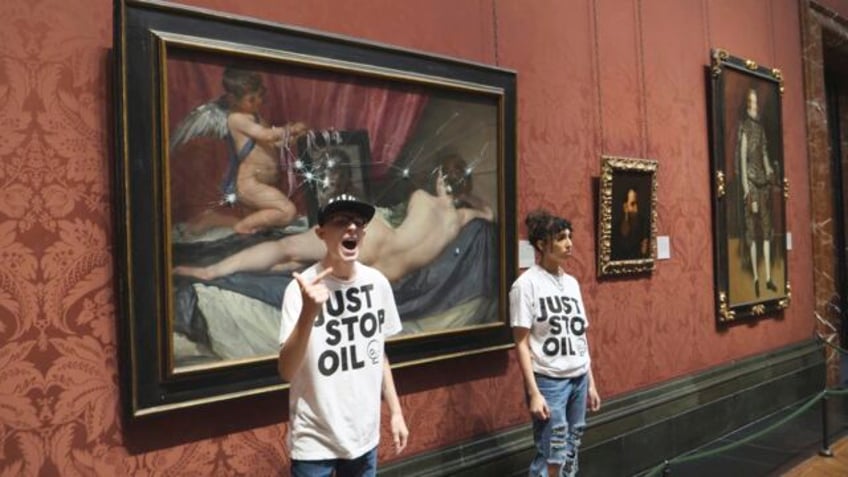 climate activists smash glass protecting velazquezs venus painting in londons national gallery