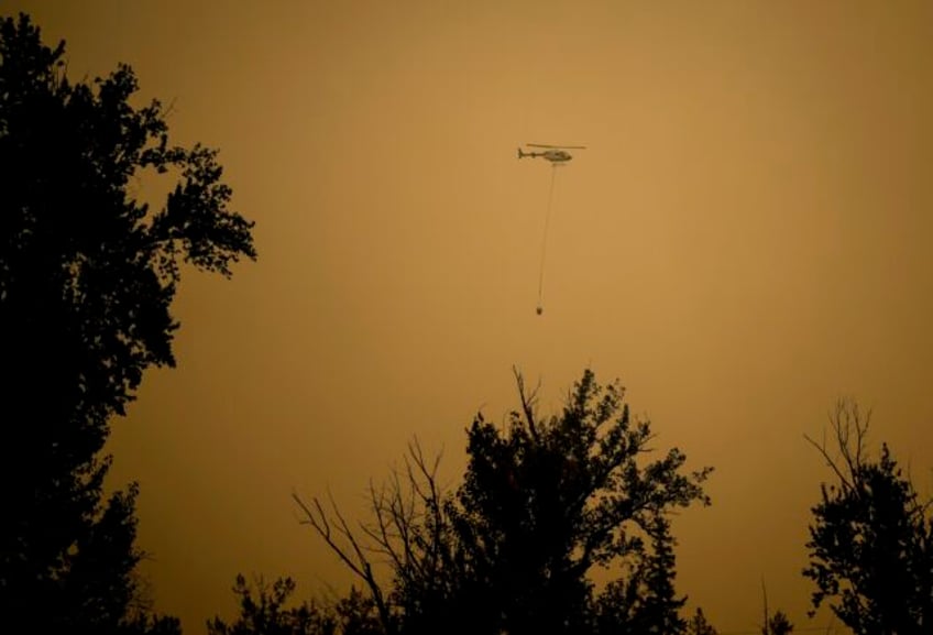 climate change doubled chance of weather conditions that led to record quebec fires researchers say