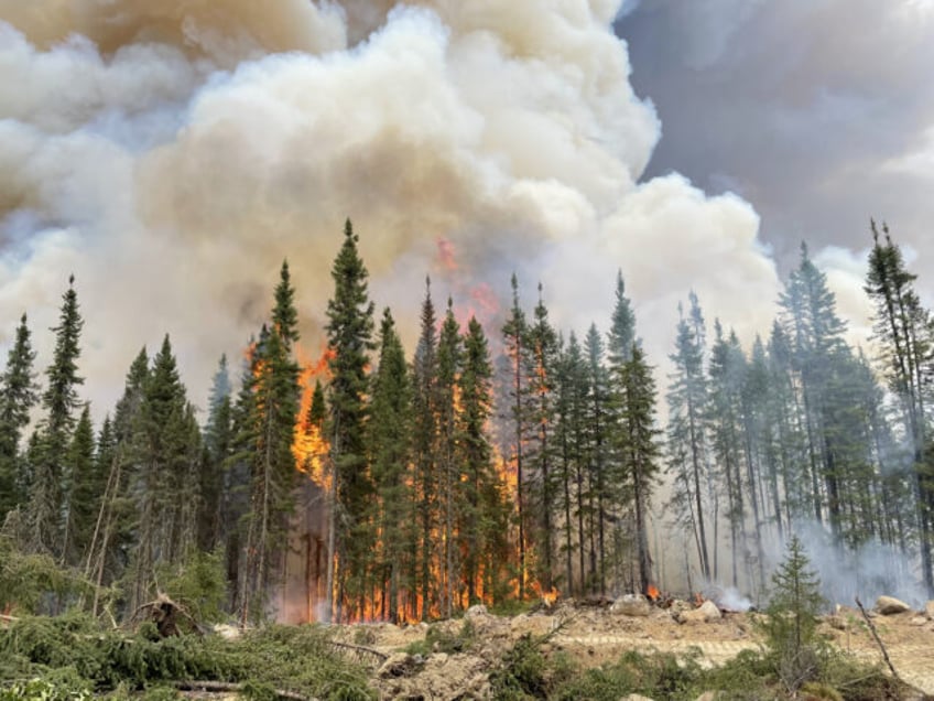 QUEBEC, CANADA - JUNE 23 : (----EDITORIAL USE ONLY â" "MANDATORY CREDIT - FREDERIC CHOUINARD / SOPFEU" - NO MARKETING NO ADVERTISING CAMPAIGNS - DISTRIBUTED AS A SERVICE TO CLIENTS----) A view of wildfires at Lebel-sur-Quevillon in Quebec, Canada on June 23, 2023. (Photo by FREDERIC CHOUINARD /SOPFEU / Handout/Anadolu …