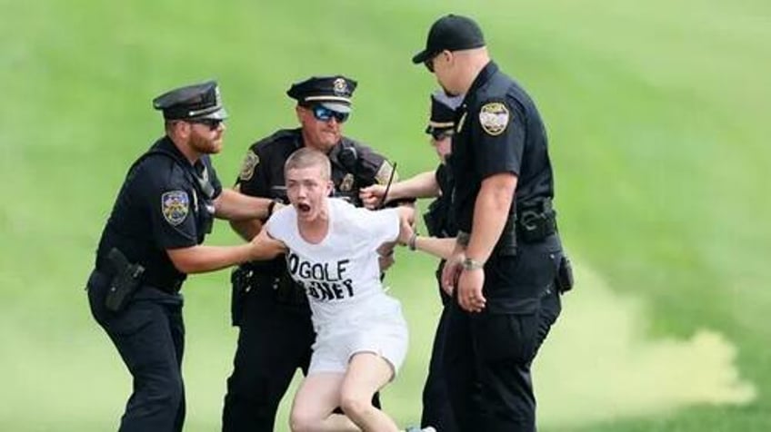 climate protesters out of control as they attack stonehenge and disrupt pga championship