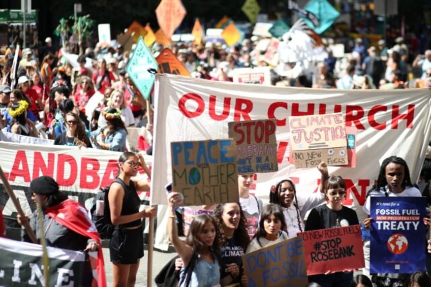 climate protesters throng new york demand end to fossil fuels