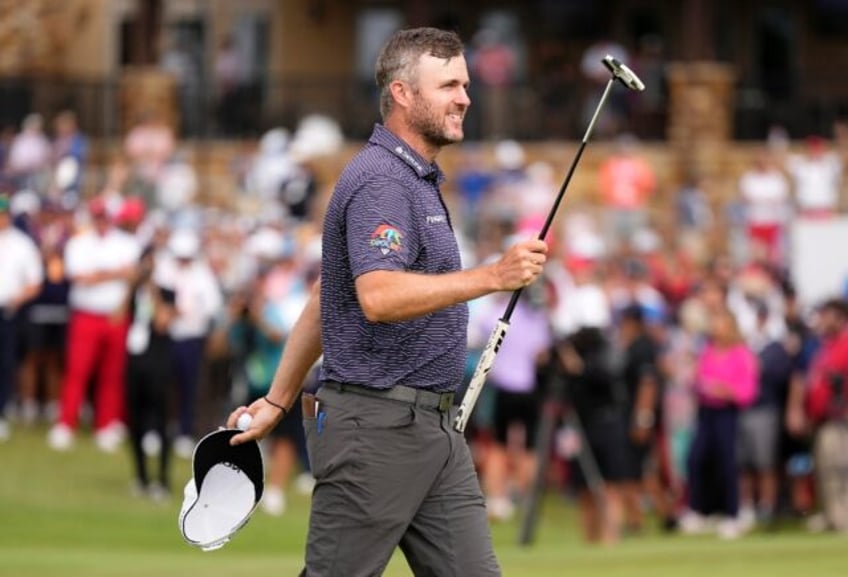 Canada's Taylor Pendrith reacts after holing a putt at the 72nd hole to win the PGA Tour C