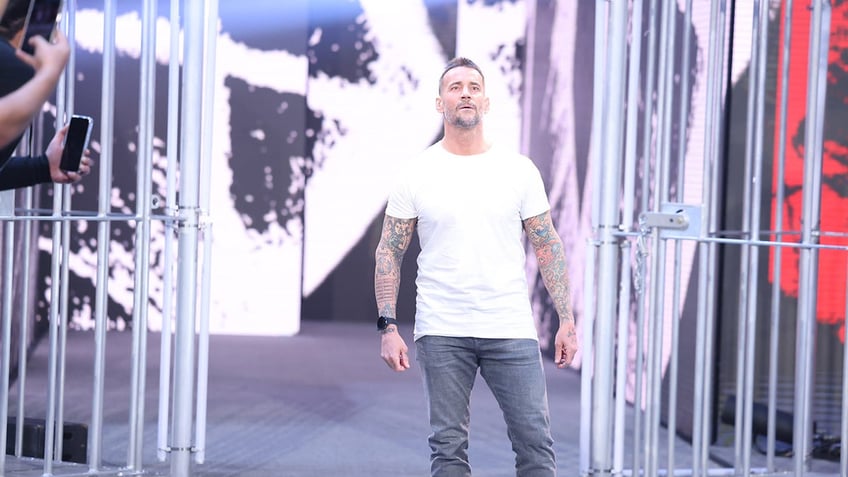 cm punk addresses wwe fans in return to monday night raw im home