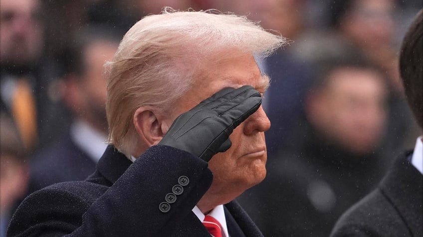 President-elect Trump lays a wreath at Arlington National Cemetery ahead of the Inauguration