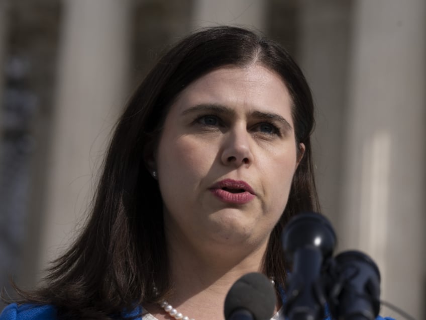 Colorado Secretary of State Jena Griswold speaks in front of the U.S. Supreme Court, Thurs