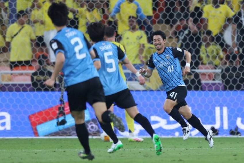 Akihiro Ienaga celebrates Kawaski's third goal against Al Nassr