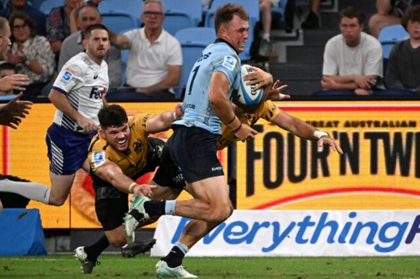 Waratah's Darby Lancaster makes a break during their Super Rugby Pacific match against the