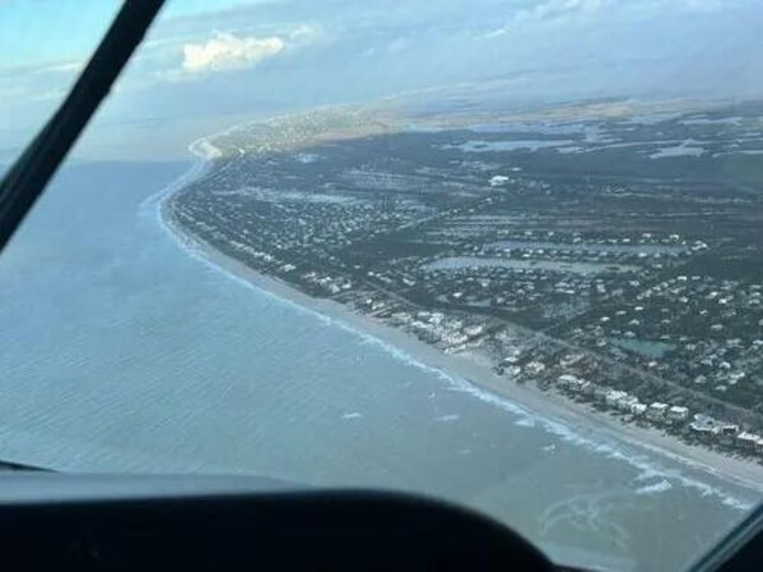 coast guard rescues man floating on cooler 30 miles off florida coast