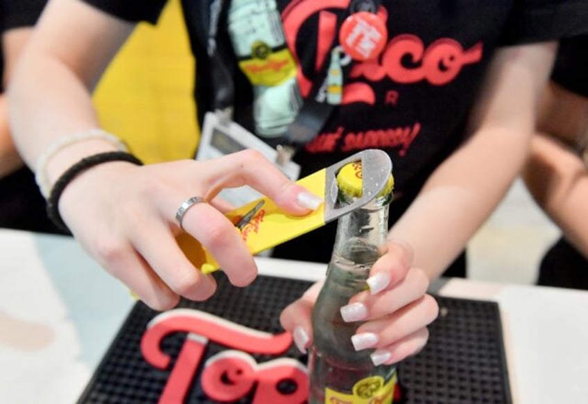 Strong sales of the Topo Chico seltzer brand helped lift Coca-Cola to better than expected