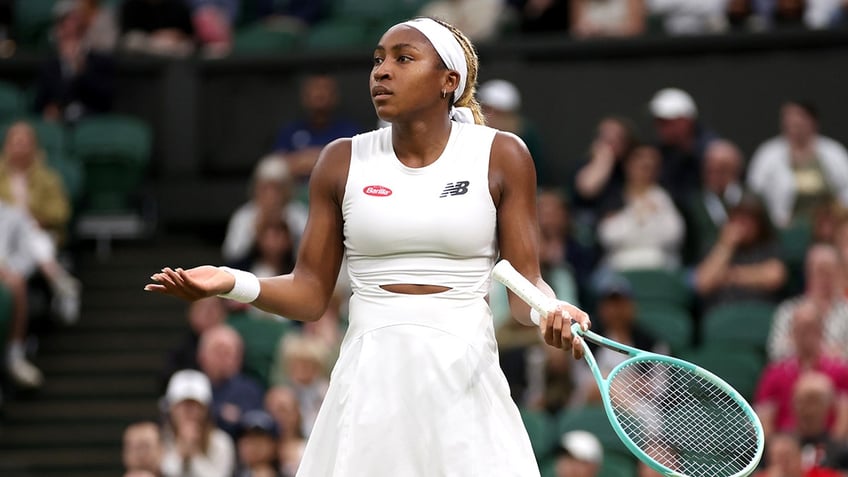 Coco Gauff reacts on court