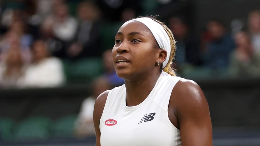 Coco Gauff reacts on court