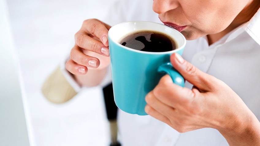 Woman drinking coffee