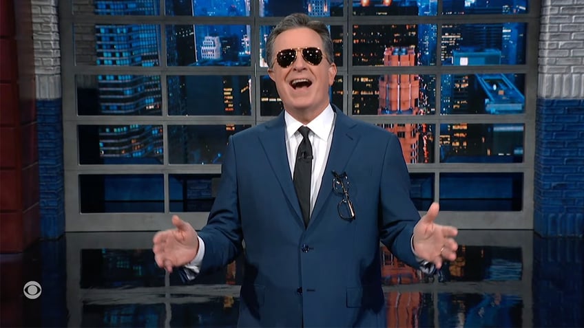 Colbert wearing aviators