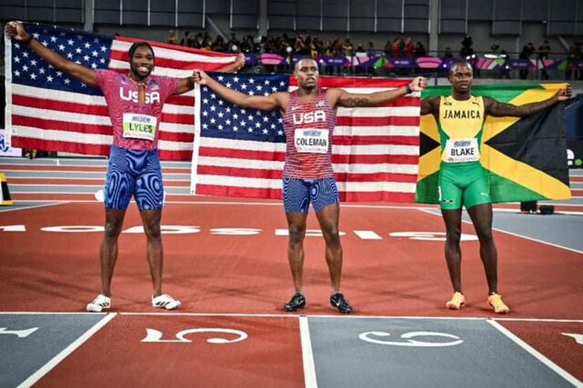 Silver medallist Noah Lyles (L), gold medallist Christian Coleman (C) and bronze medallist