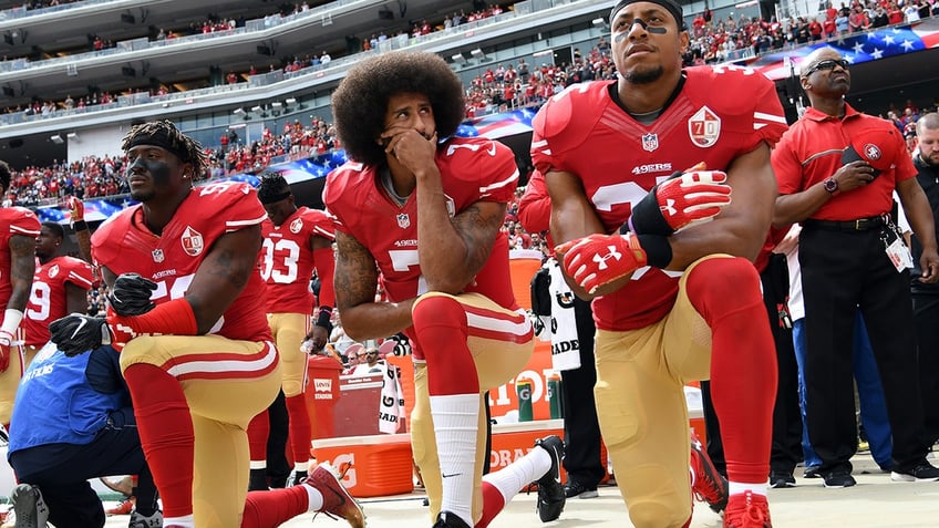 Colin Kaepernick kneels