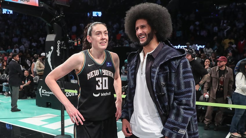 Colin Kaepernick at a WNBA game