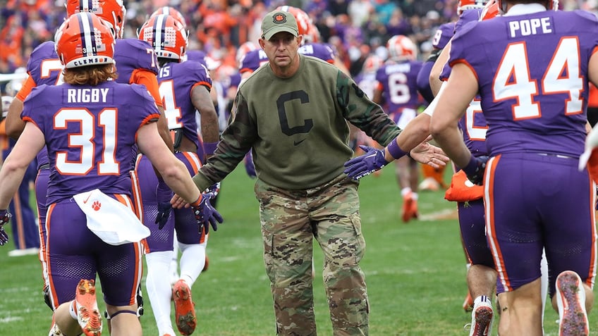 Dabo Swinney shakes hands