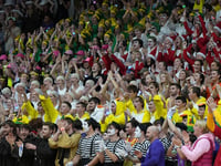 College basketball fans break silence, storm the court as part of unique Christmas tradition