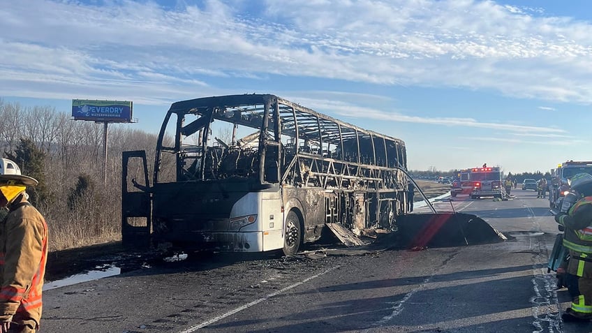 Indiana University Indianapolis' bus carrying the men's basketball team caught fire on the highway on Saturday.