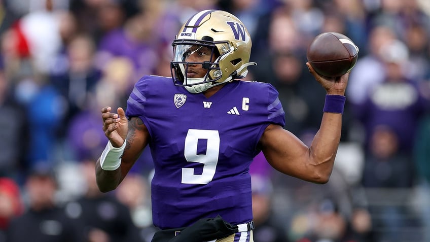 college football playoff rankings washington breaks into top 4 as georgia retains no 1 spot