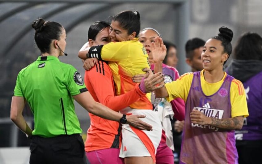 Colombia's Catalina Usme celebrates scoring her team's second goal in a 2-1 victory over A