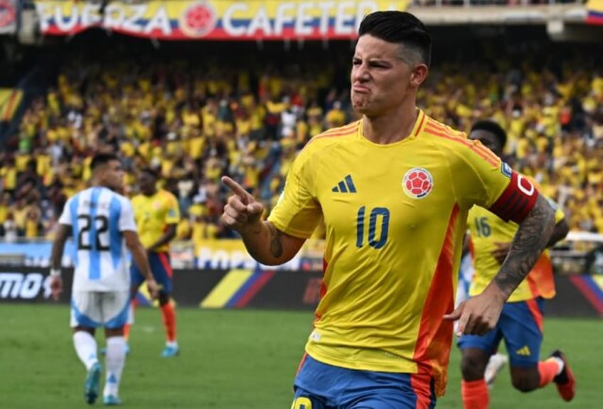 Colombia captain James Rodriguez celebrates his winning penalty in Tuesday's World Cup qua