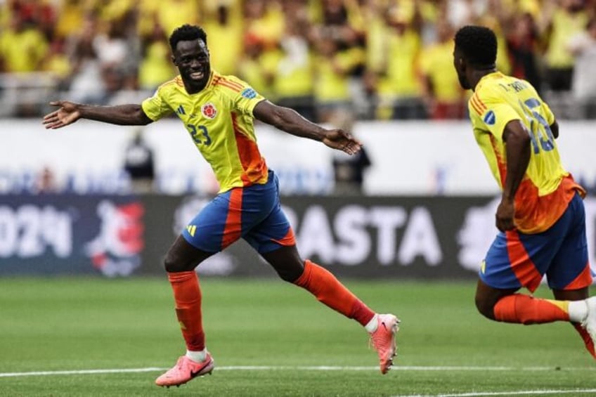 Davinson Sanchez celebrates after scoring Colombia's second goal in a 3-0 win over Costa R