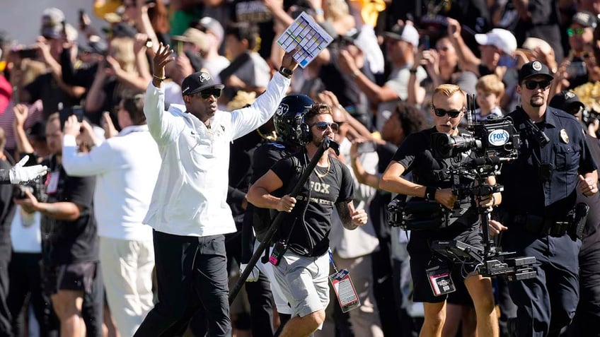 colorado fans storm field after deion sanders win over nebraska shedeur breaks out dads touchdown dance