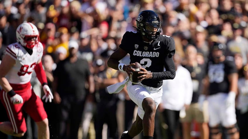 colorado fans storm field after deion sanders win over nebraska shedeur breaks out dads touchdown dance