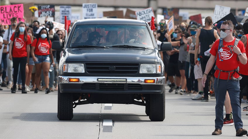 Demonstrators on I-225