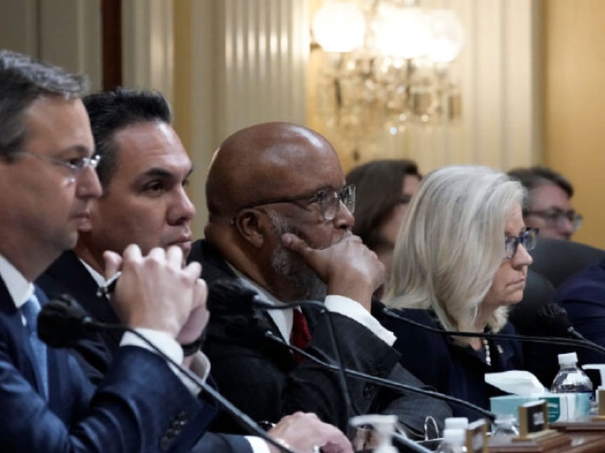 Liz Cheney (R-WY), vice chairwoman of the partisan January 6th Committee, sits with her fellow committee members during one of the hearings.