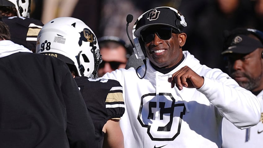 Deion Sanders celebrates