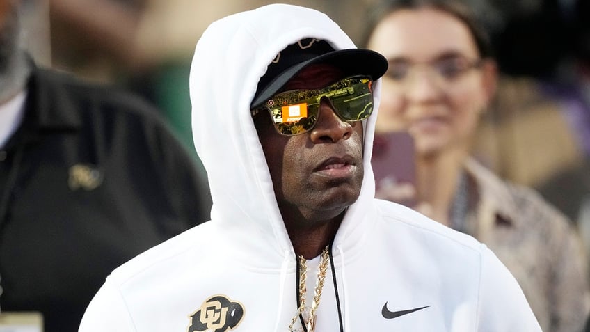 Deion Sanders looks on vs Colorado State