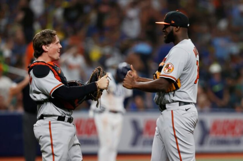 colton cowser hits 10th inning sacrifice fly as baltimore orioles top tampa bay rays 4 3