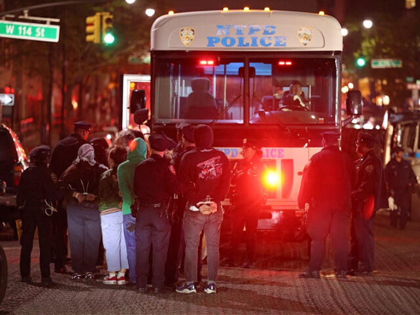 TOPSHOT - NYPD officers arrest students at Columbia University in New York City on April 3