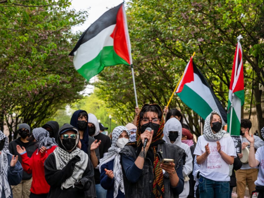 NEW YORK, NEW YORK - APRIL 30: Pro-Palestinian supporters continue to demonstrate with a p