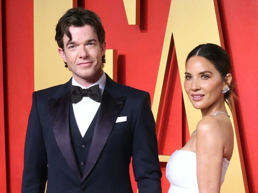 John Mulaney and Olivia Munn attend the 2024 Vanity Fair Oscar Party hosted by Radhika Jon