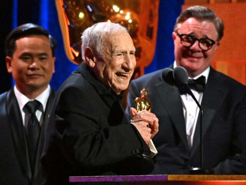 US actor Mel Brooks (2nd L) accepts the Academy Honorary Award during the Academy of Motion Picture Arts and Sciences' 14th Annual Governors Awards at the Ray Dolby Ballroom in Los Angeles on January 9, 2024. (Photo by Robyn BECK / AFP)