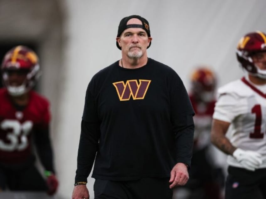 ASHBURN, VA - MAY 10: Head coach Dan Quinn of the Washington Commanders looks on during Wa