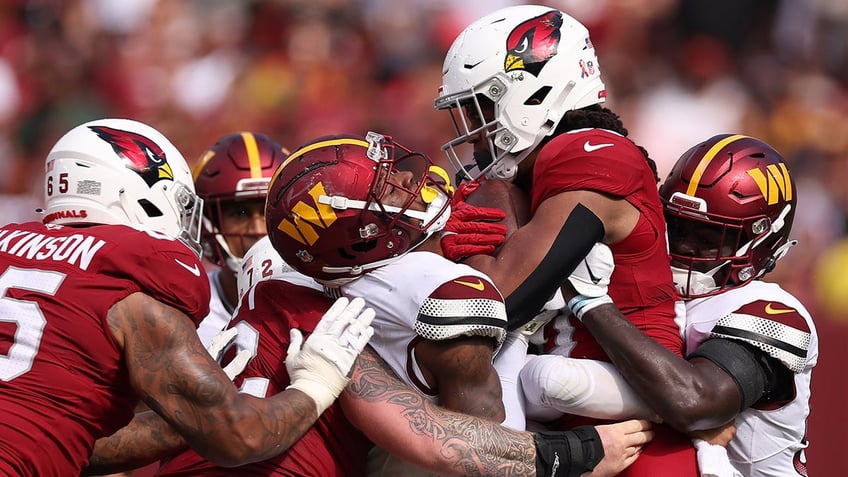 commanders outlast cardinals in thrilling opening day win