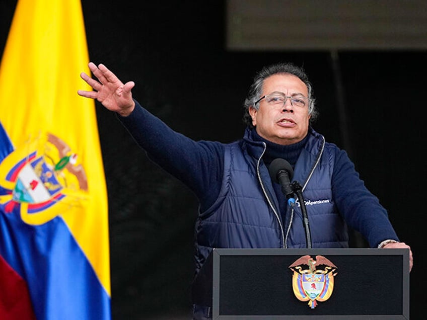 Colombia's President Gustavo Petro delivers a speech after signing a reform of the pension