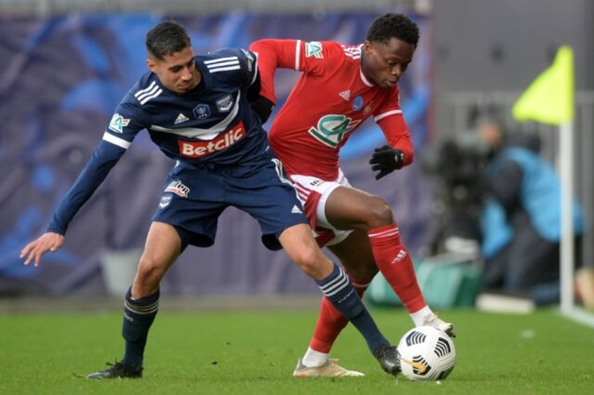 Comoros match-winner Rafiki Said (R) playing for former club Brest in the 2022 French Cup.