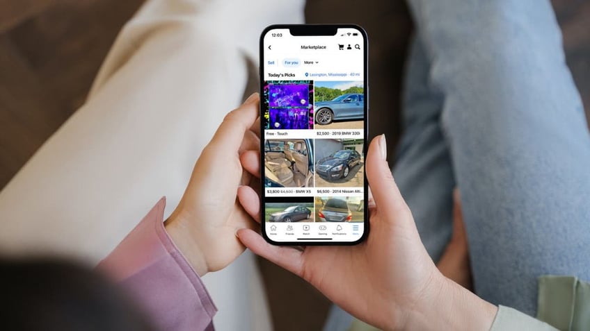 Woman looking at the Facebook Marketplace on her phone.