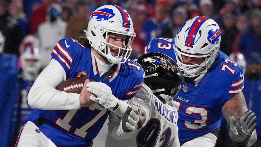 Josh Allen carries the ball