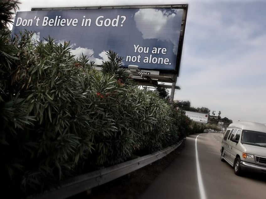 A sign is displayed along Interstate 8 in San Diego, CA by The San Diego Coalition of Reas