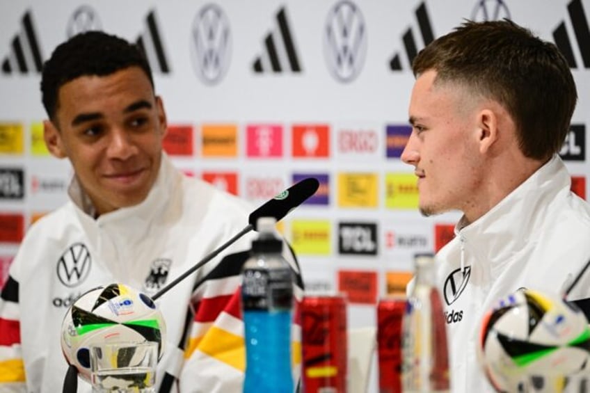 Germany midfielders Jamal Musiala (L) and Florian Wirtz (R) are set to line up alongside e