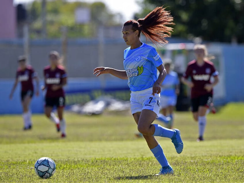 Argentine transgender footballer Mara Gomez of Villa San Carlos controls the ball during an Argentina first division female football match against Lanus at Genacio Salice stadium in Berisso, Buenos Aires, Argentina on December 7, 2020. - Gomez is the first transgender footballer to play in the first division of the …